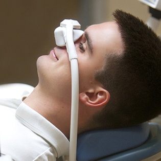 Man relaxing with nitrous oxide sedation in Marlton